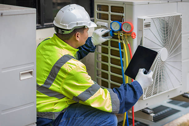Professional Air Conditioning Repair technician working in Hope, IN